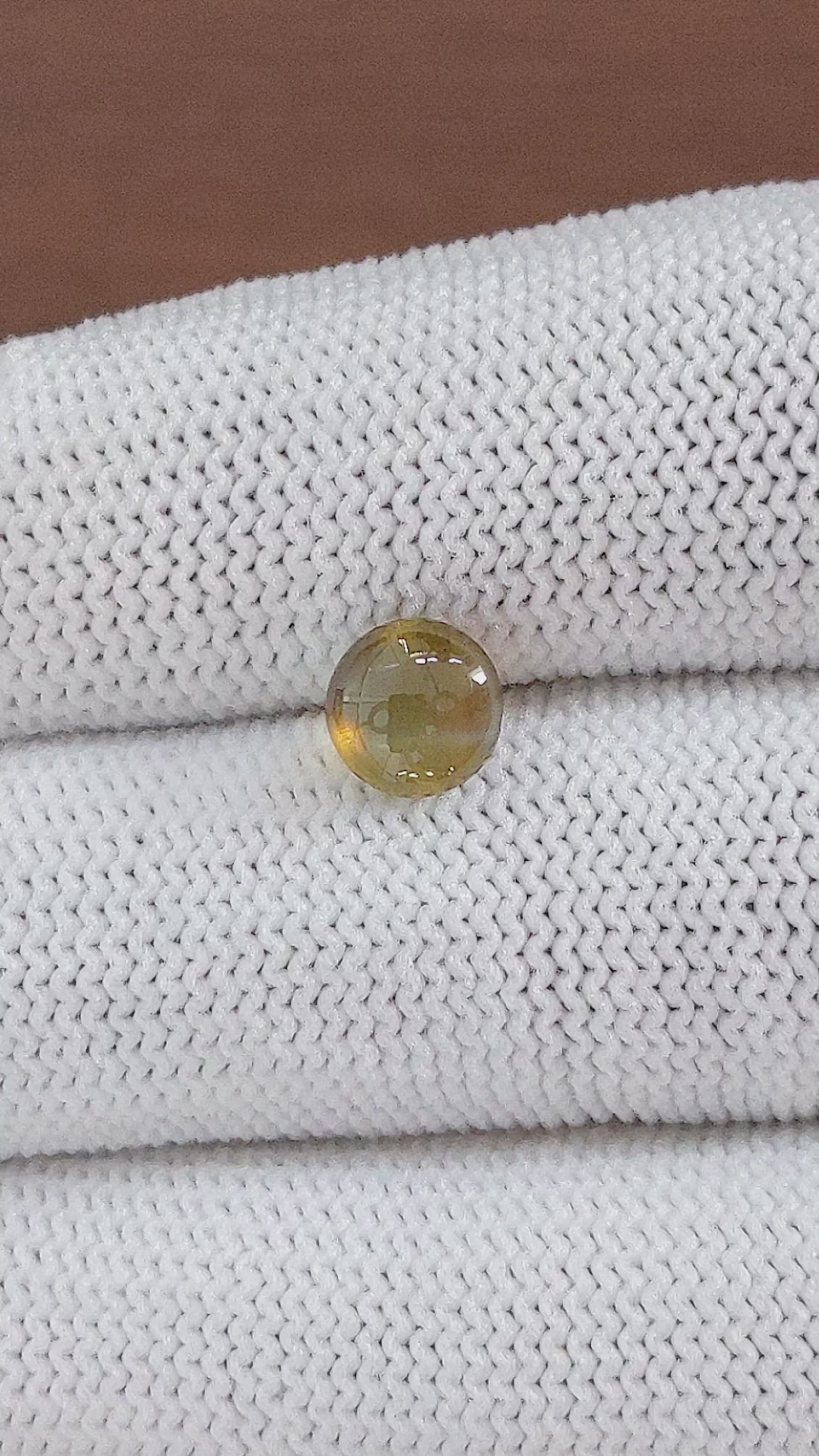 1.85 Ct. Greenish Brown Cabochon Chrysoberyl from Ceylon (Sri Lanka) Size Video