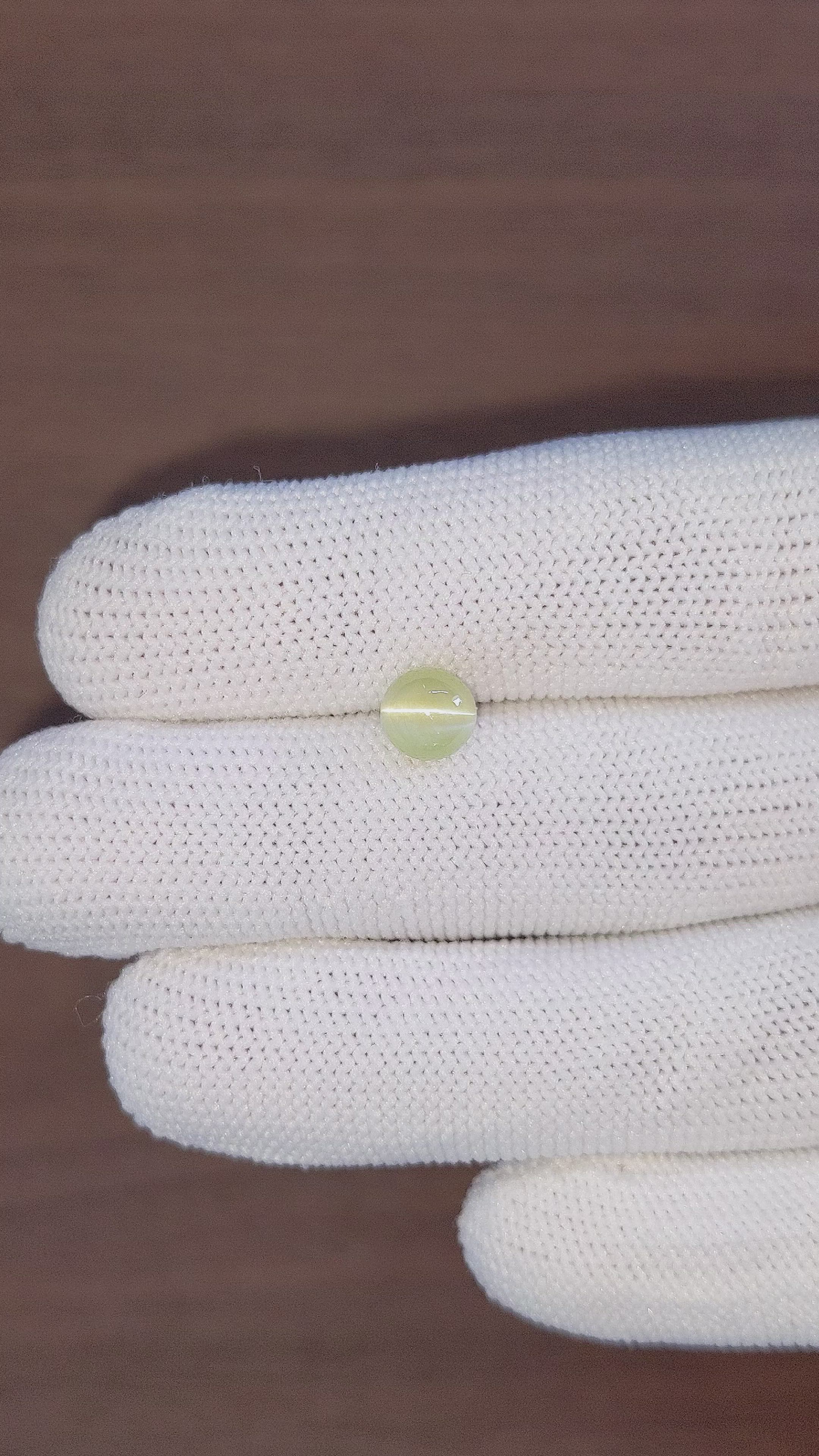 2.11 Ct. Greenish Yellow Cabochon Chrysoberyl from Madagascar Size Video