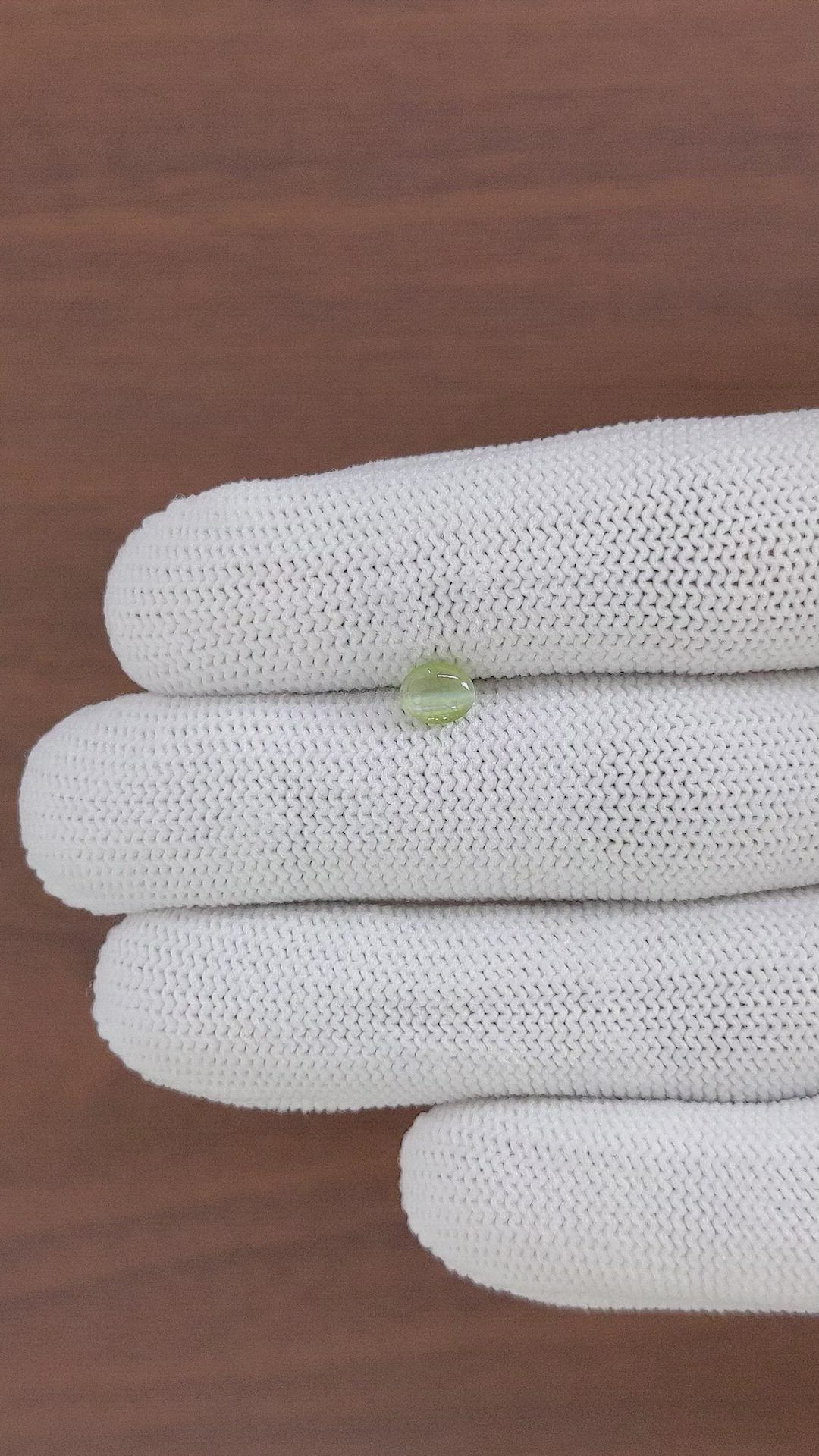 0.67 Ct. Green Cabochon Chrysoberyl from Tanzania Size Video