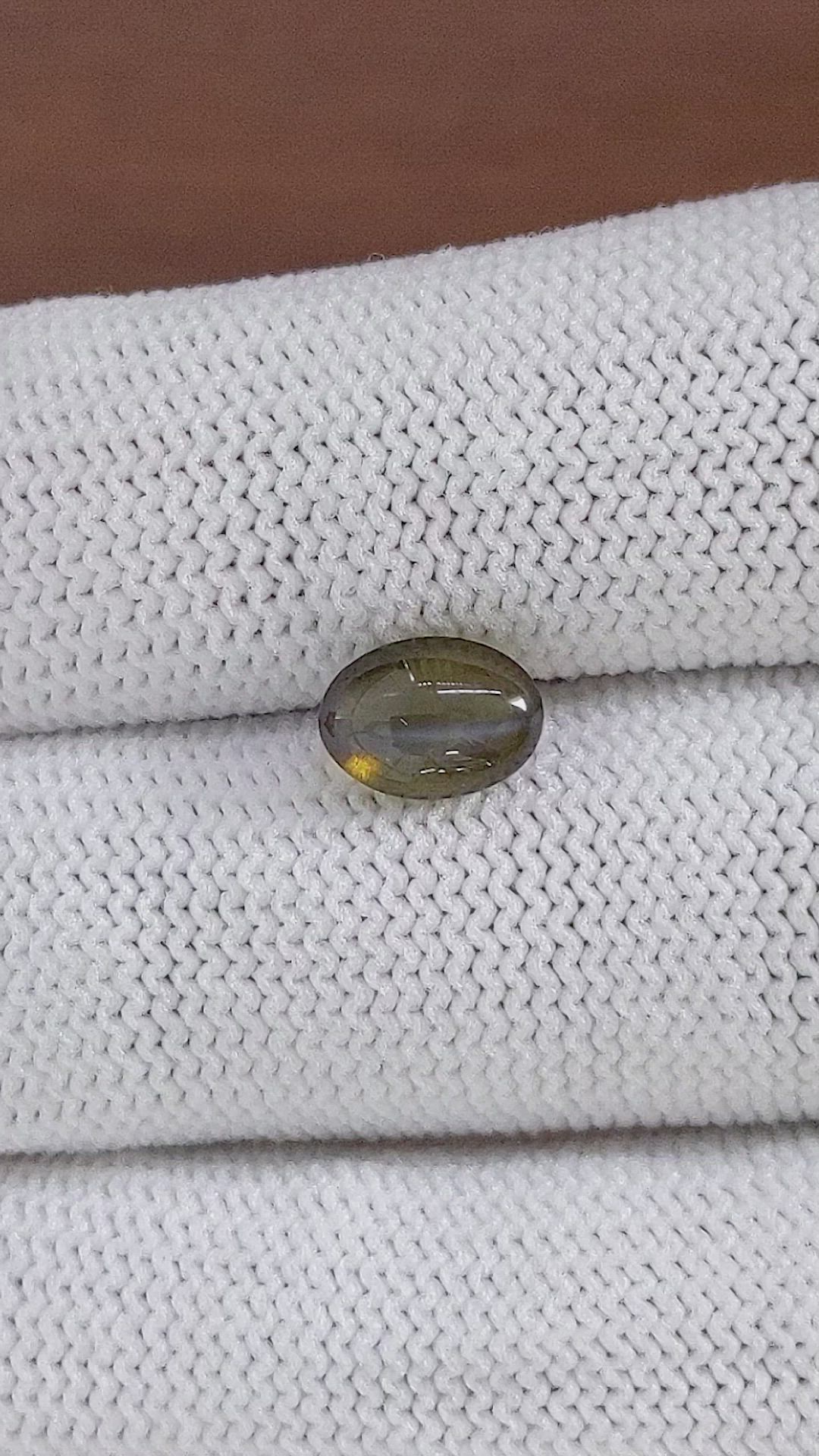 2.32 Ct. Greenish Brown Cabochon Chrysoberyl from Tanzania Size Video