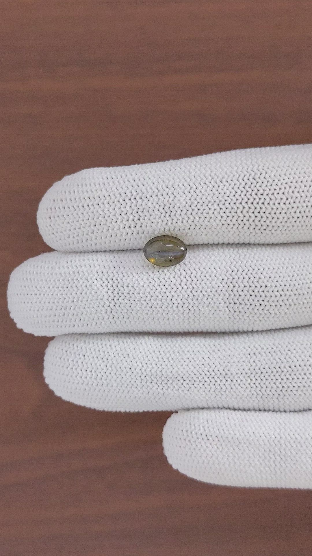 2.32 Ct. Greenish Brown Cabochon Chrysoberyl from Tanzania Size Video