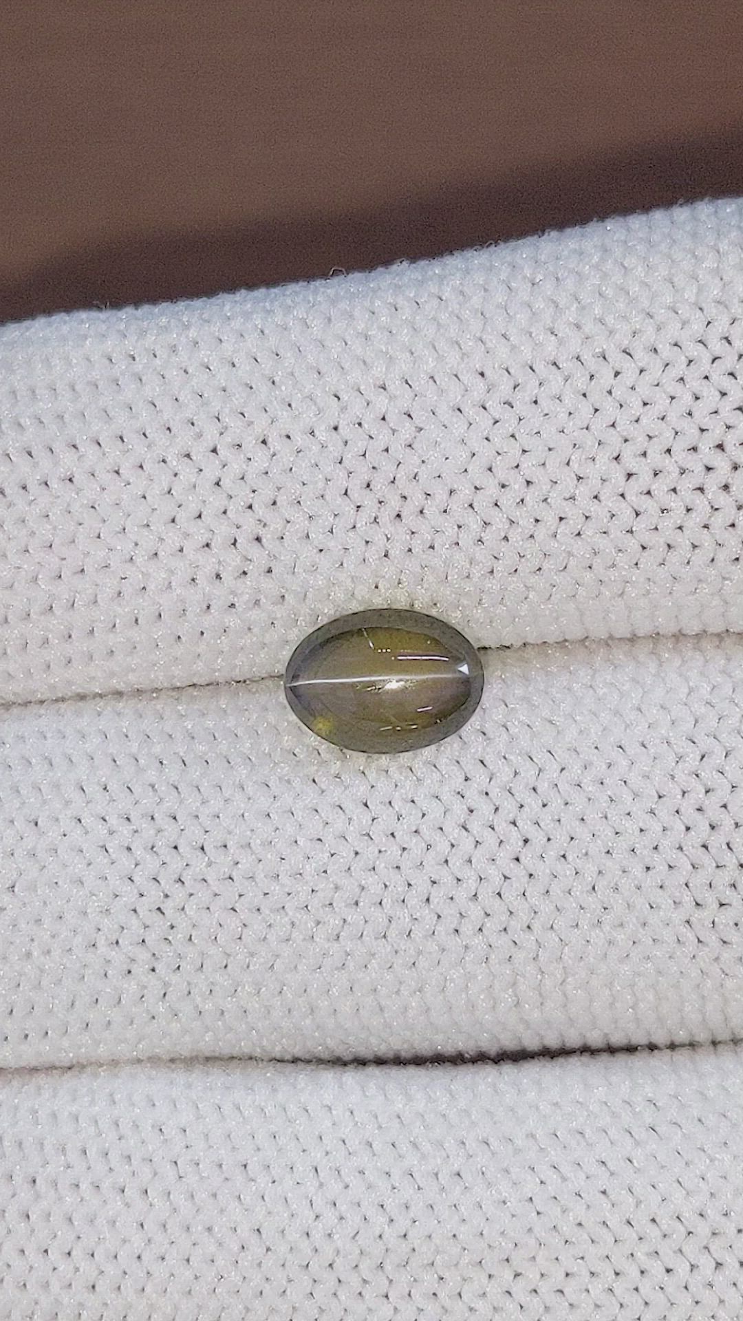 2.32 Ct. Greenish Brown Cabochon Chrysoberyl from Tanzania Size Video