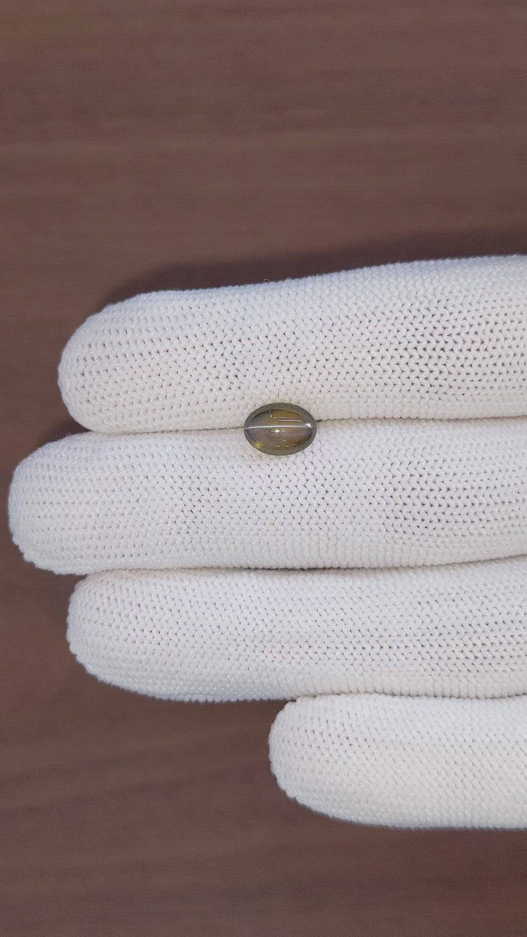 2.32 Ct. Greenish Brown Cabochon Chrysoberyl from Tanzania Size Video