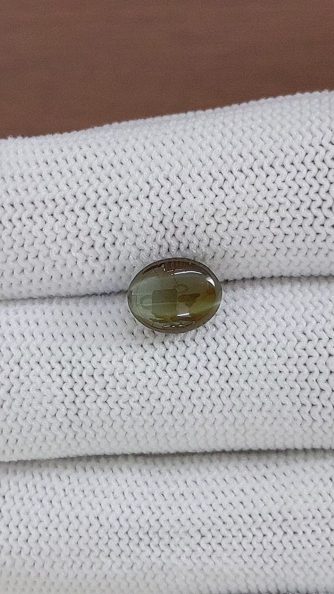 3.53 Ct. Brownish Green Cabochon Chrysoberyl from Tanzania Size Video
