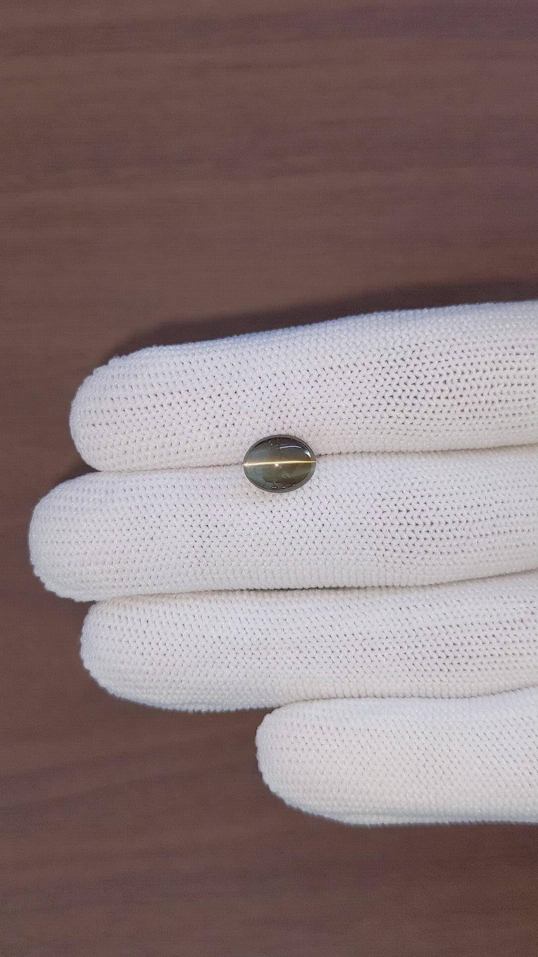 3.53 Ct. Brownish Green Cabochon Chrysoberyl from Tanzania Size Video