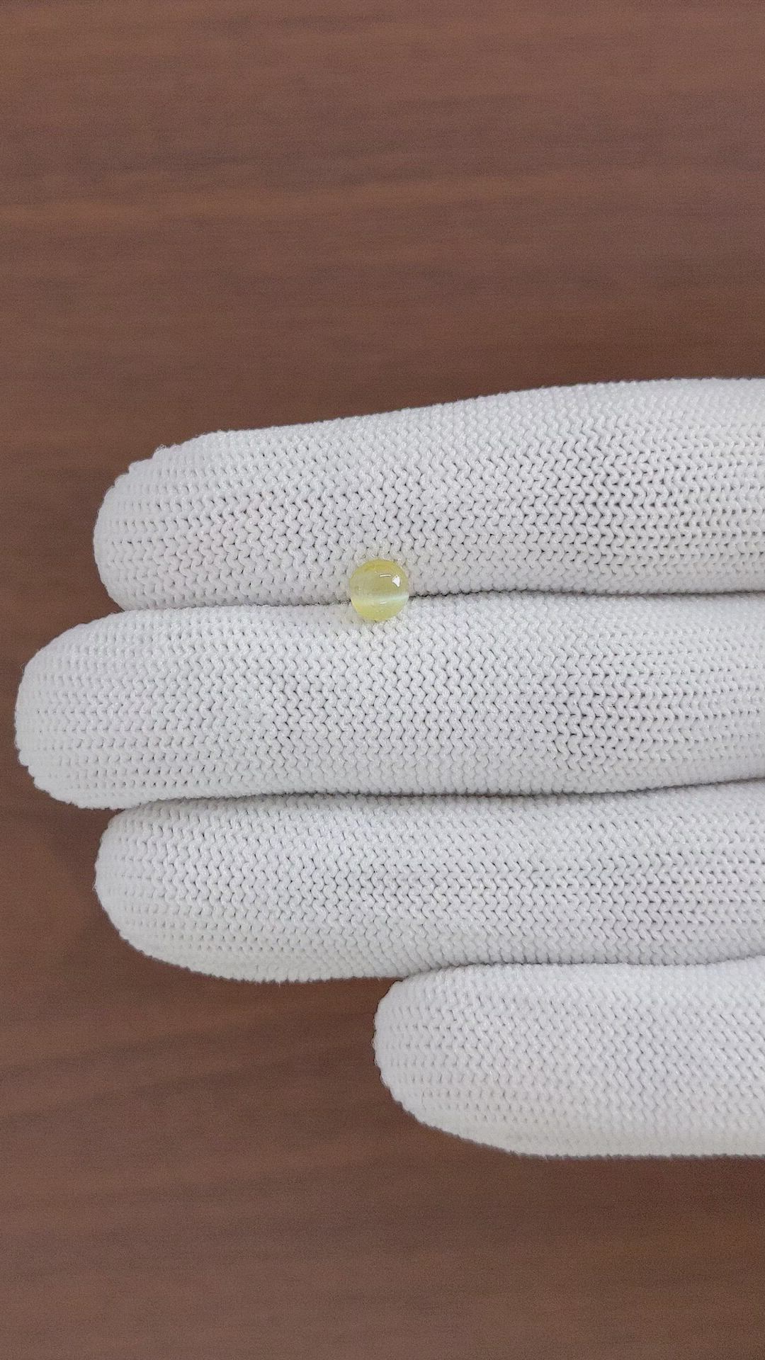 0.92 Ct. Greenish Yellow Cabochon Chrysoberyl from Tanzania Size Video