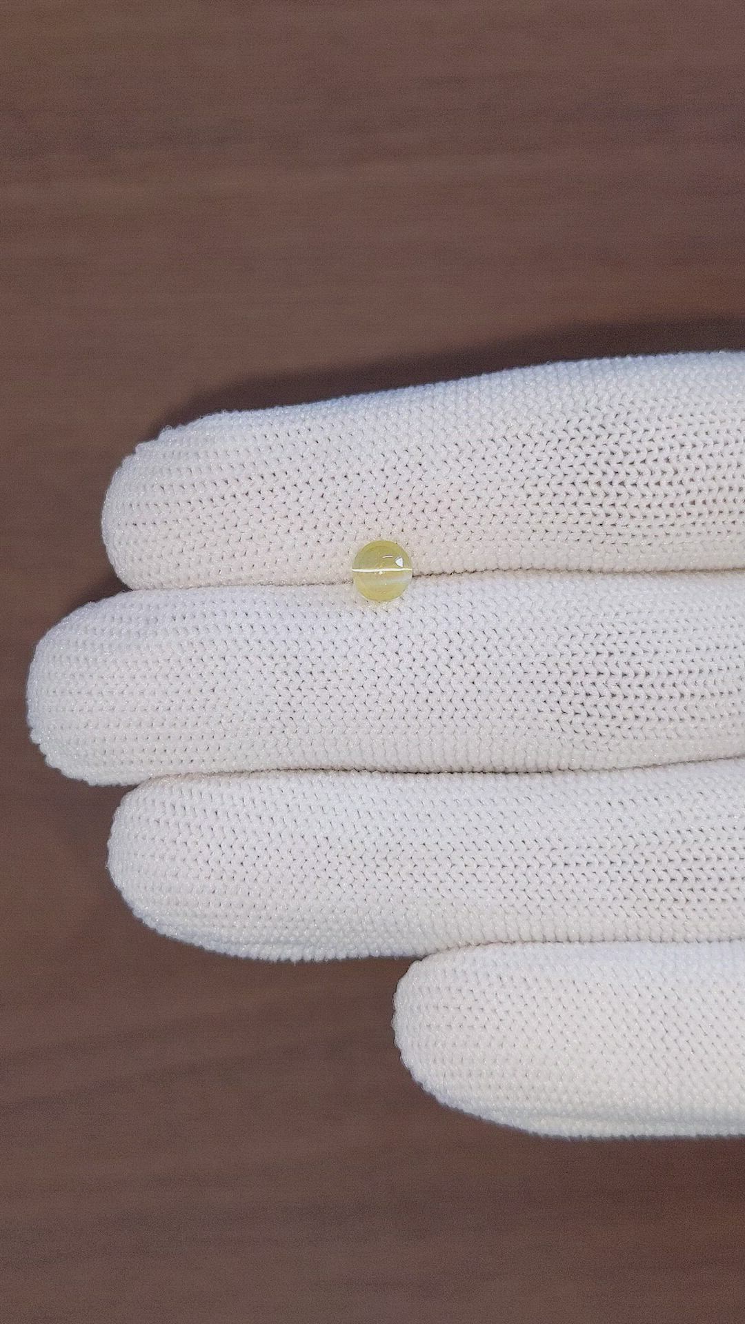 0.92 Ct. Greenish Yellow Cabochon Chrysoberyl from Tanzania Size Video