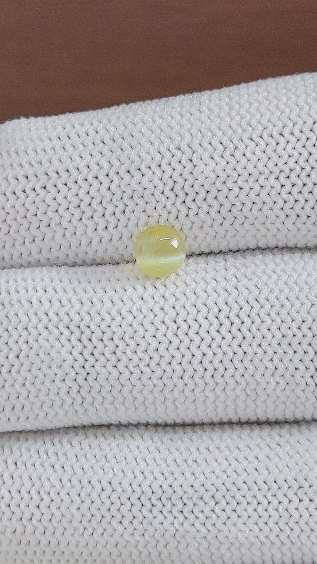 0.92 Ct. Greenish Yellow Cabochon Chrysoberyl from Tanzania Size Video