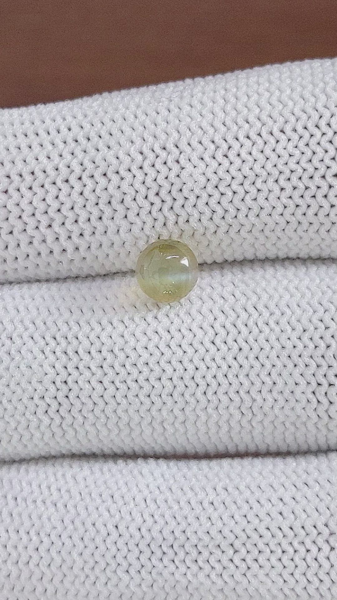 1.65 Ct. Greenish Brown Cabochon Chrysoberyl from Tanzania Size Video