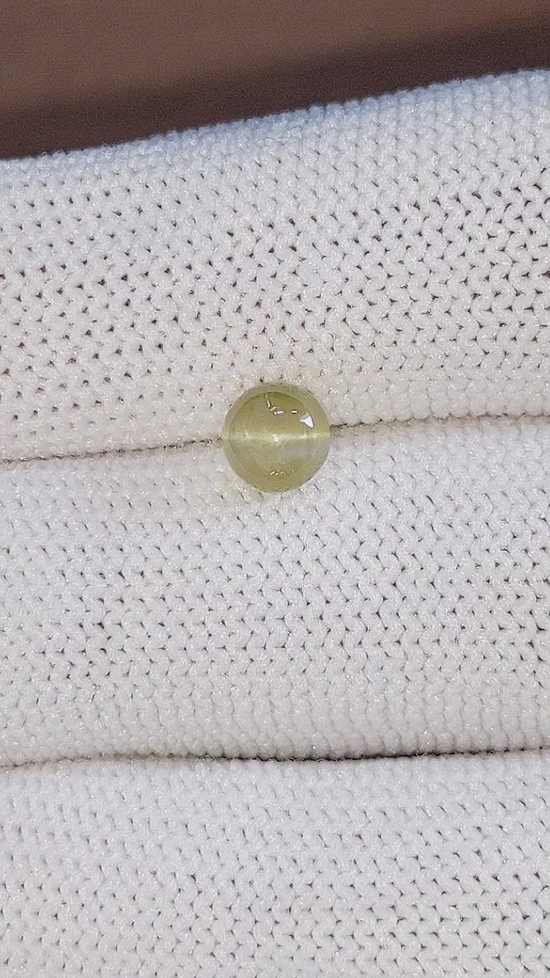 1.65 Ct. Greenish Brown Cabochon Chrysoberyl from Tanzania Size Video