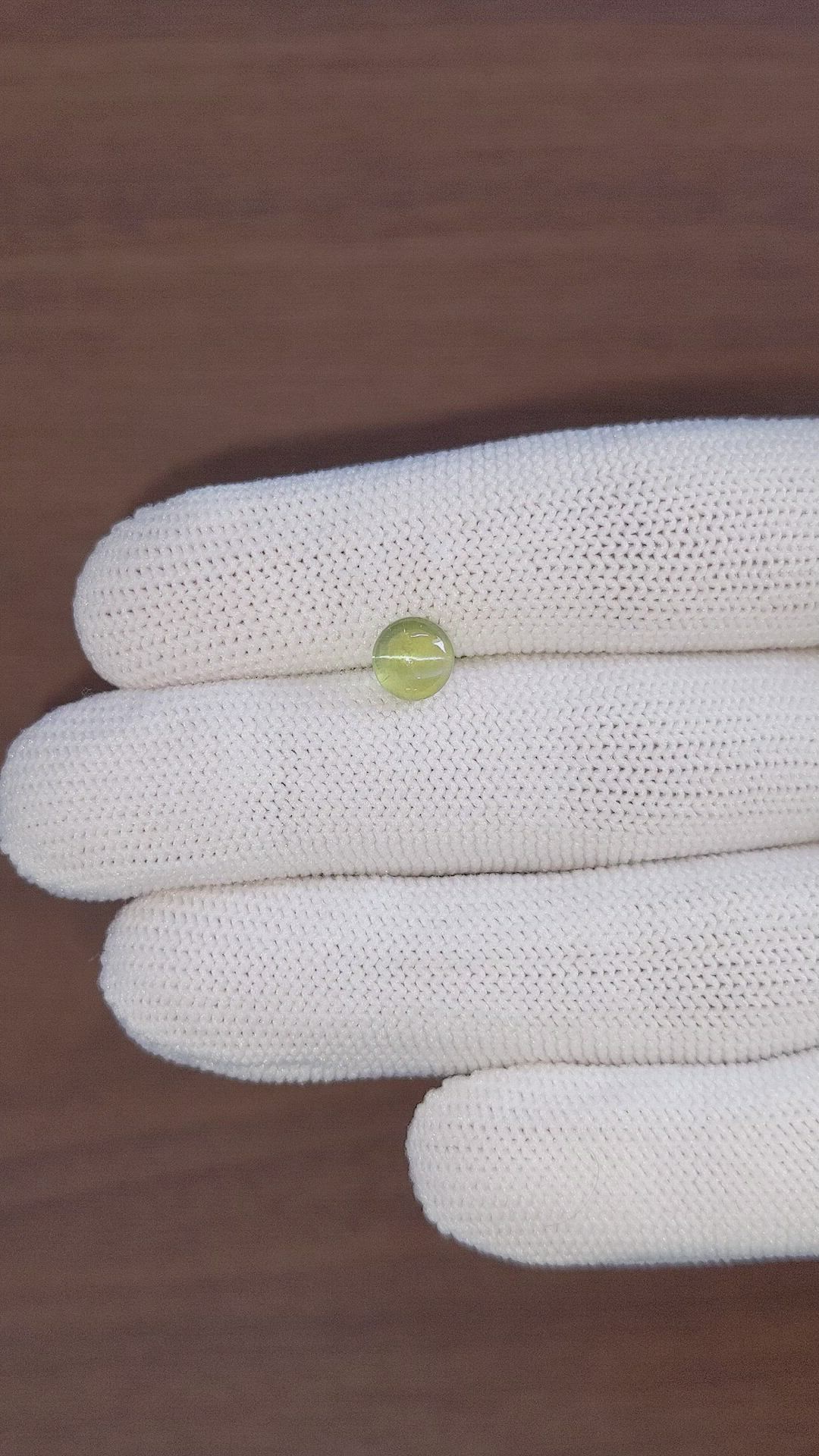 1.93 Ct. Yellowish Green Cabochon Chrysoberyl from Tanzania Size Video