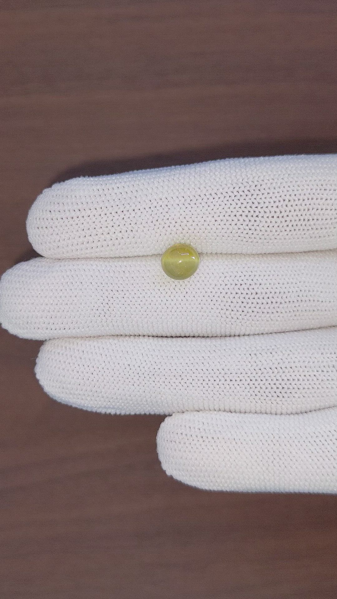 3.62 Ct. Yellowish Green Cabochon Chrysoberyl from Tanzania Size Video