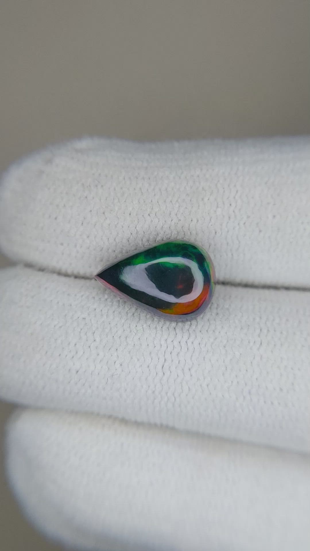 1.56 Ct. Multi Color Cabochon Black Opal from Ethiopia Size Video