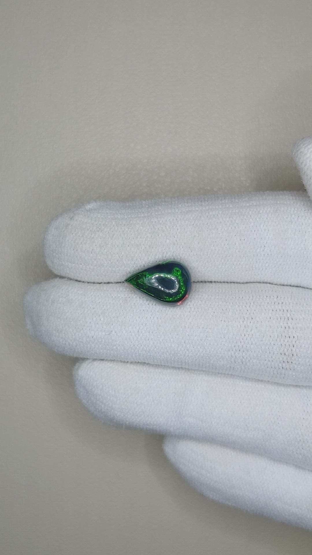 1.56 Ct. Multi Color Cabochon Black Opal from Ethiopia Size Video