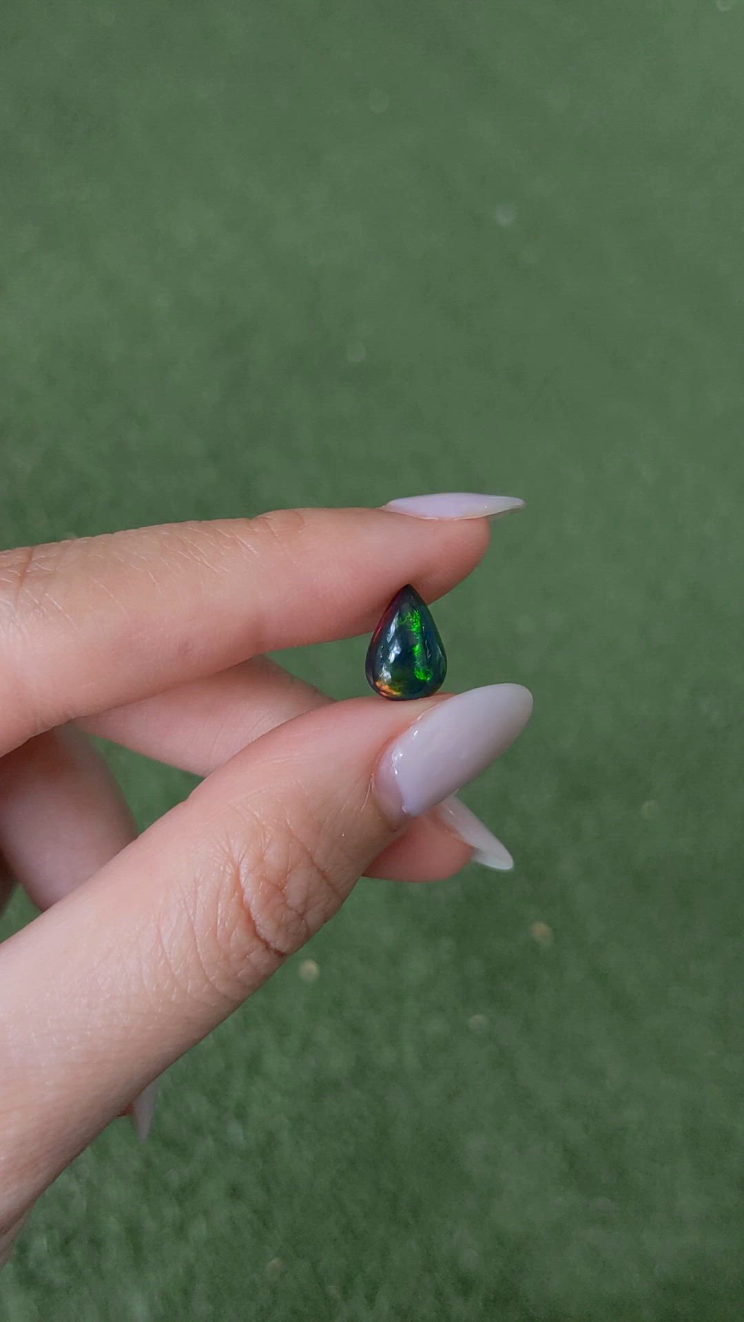 1.56 Ct. Multi Color Cabochon Black Opal from Ethiopia Size Video