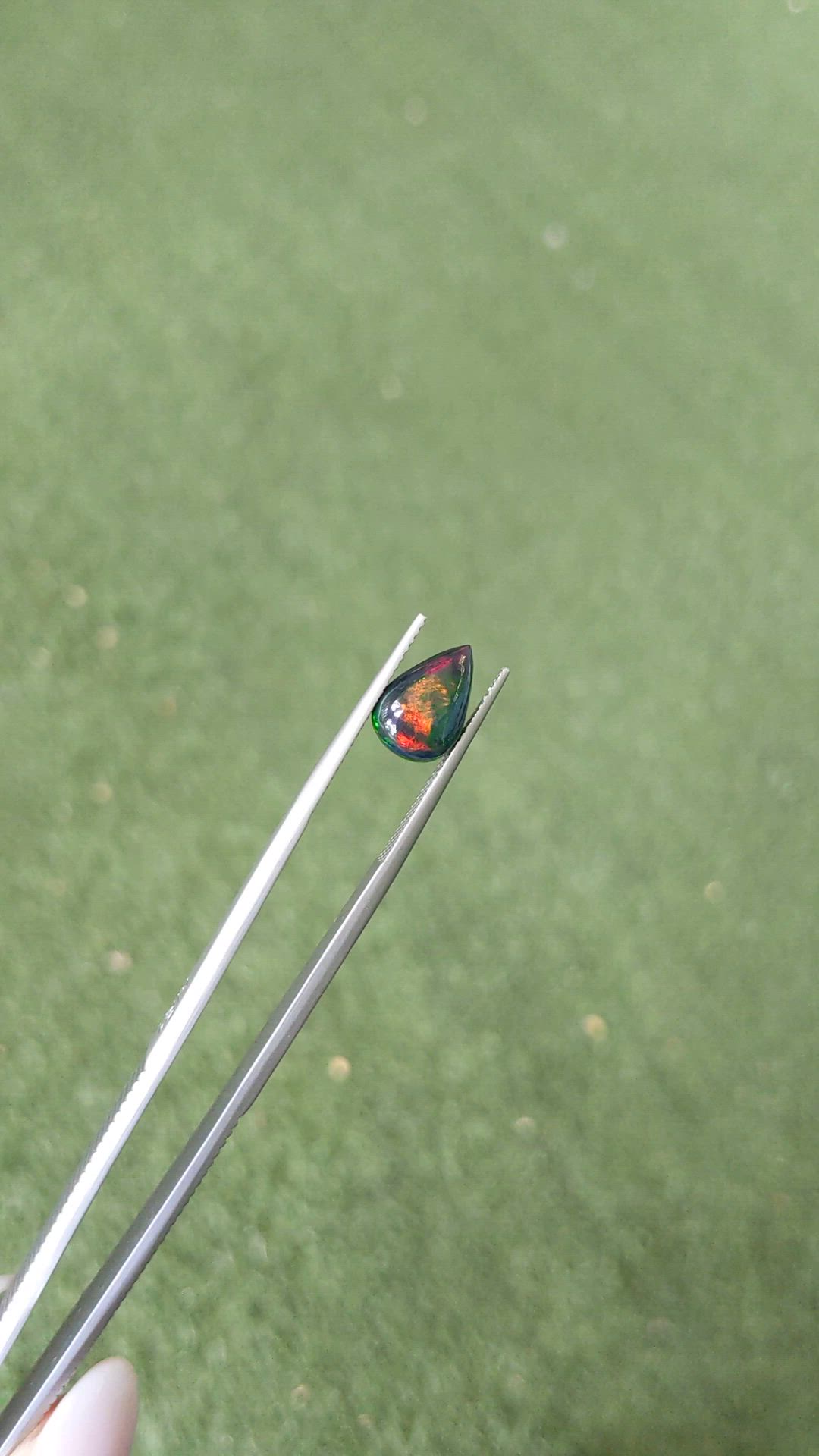 1.56 Ct. Multi Color Cabochon Black Opal from Ethiopia Size Video