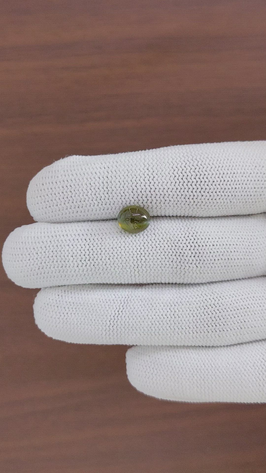 2.62 Ct. Brownish Green Cabochon Chrysoberyl from Madagascar Size Video