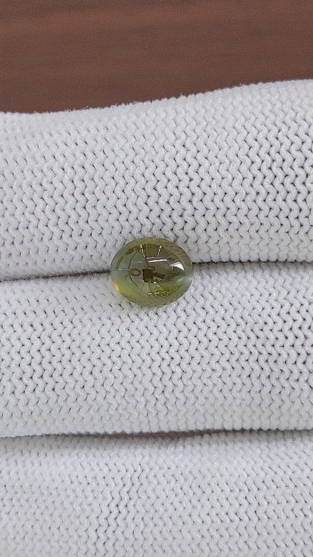 2.62 Ct. Brownish Green Cabochon Chrysoberyl from Madagascar Size Video