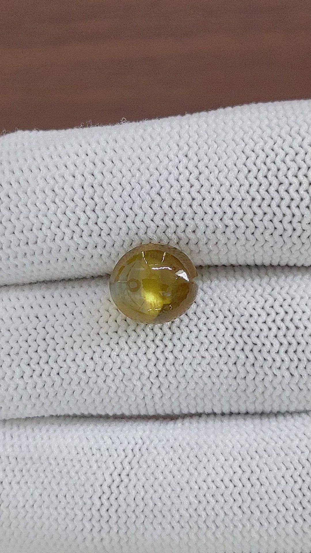 6.77 Ct. Brown Cabochon Chrysoberyl from Ceylon (Sri Lanka) Size Video