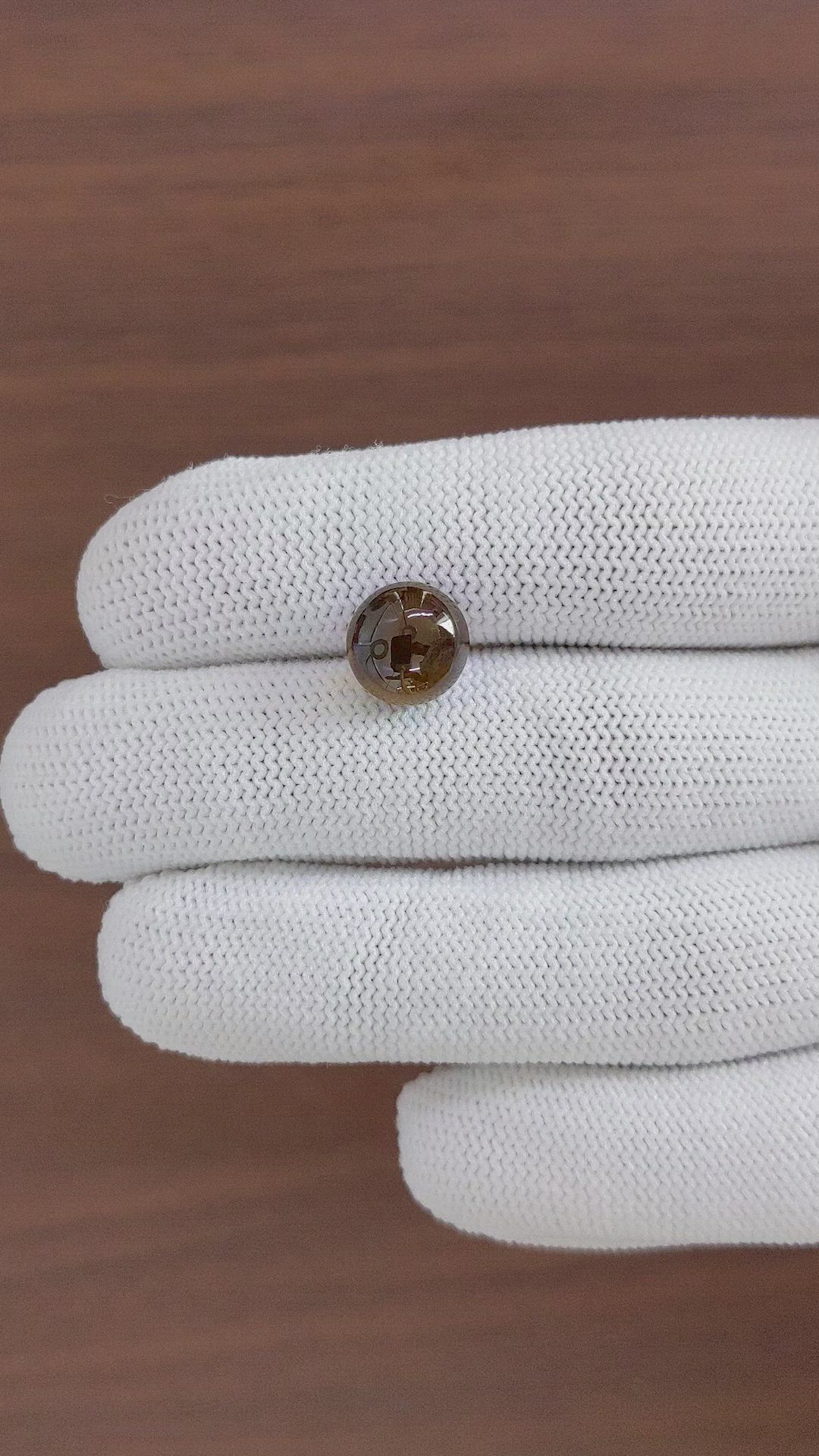 6.64 Ct. Brown Cabochon Chrysoberyl from Ceylon (Sri Lanka) Size Video