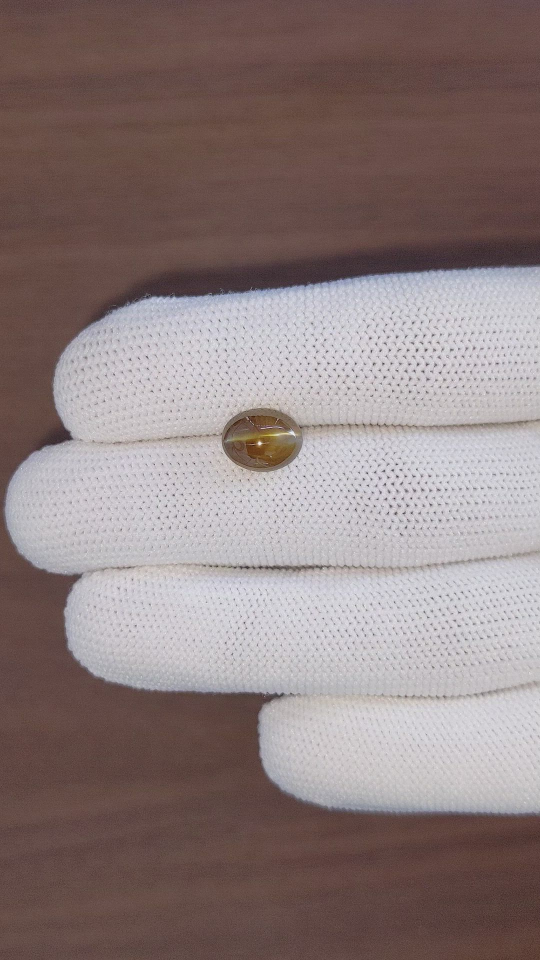 4.60 Ct. Greenish Brown Cabochon Chrysoberyl from Madagascar Size Video