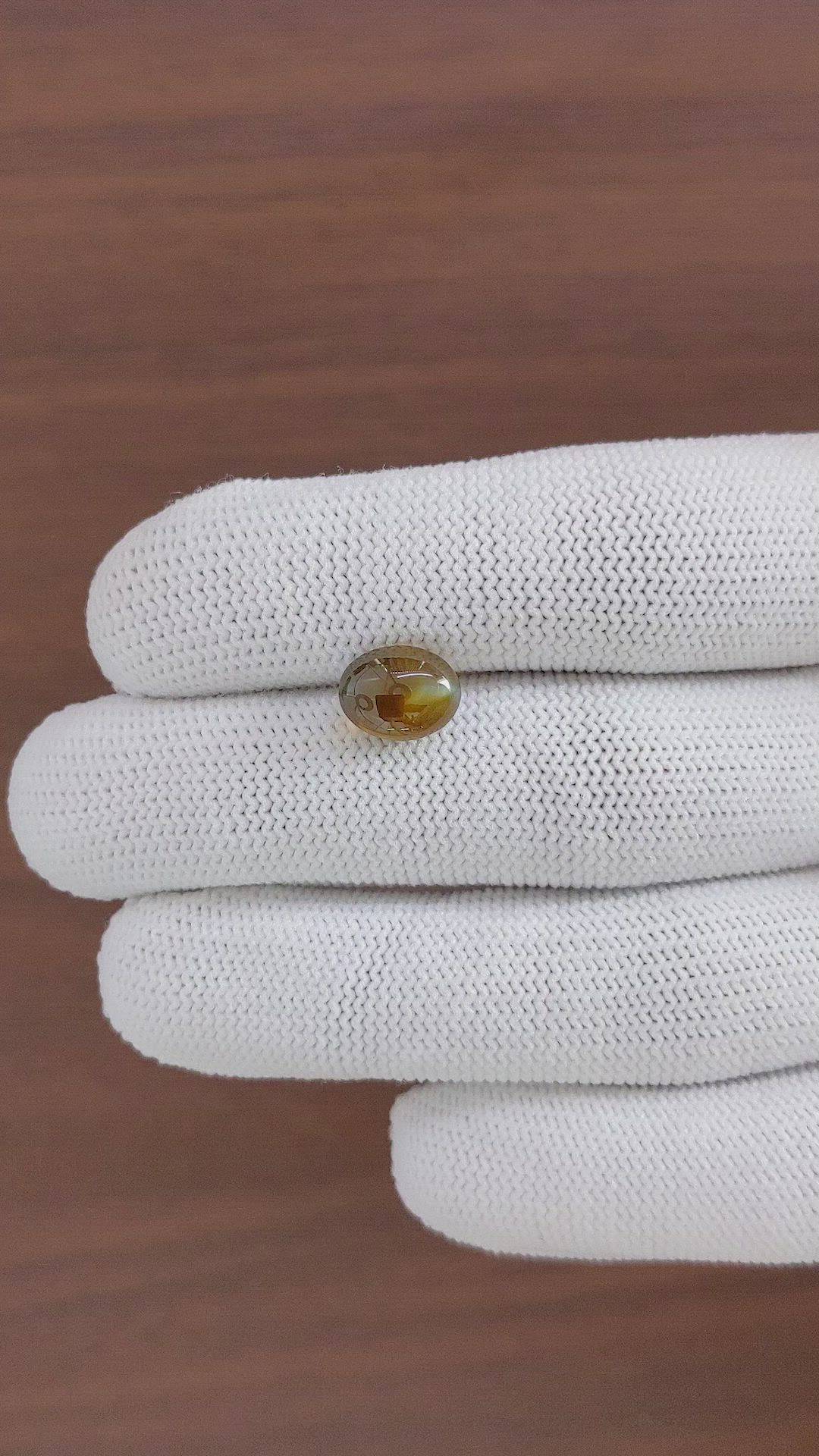 4.60 Ct. Greenish Brown Cabochon Chrysoberyl from Madagascar Size Video