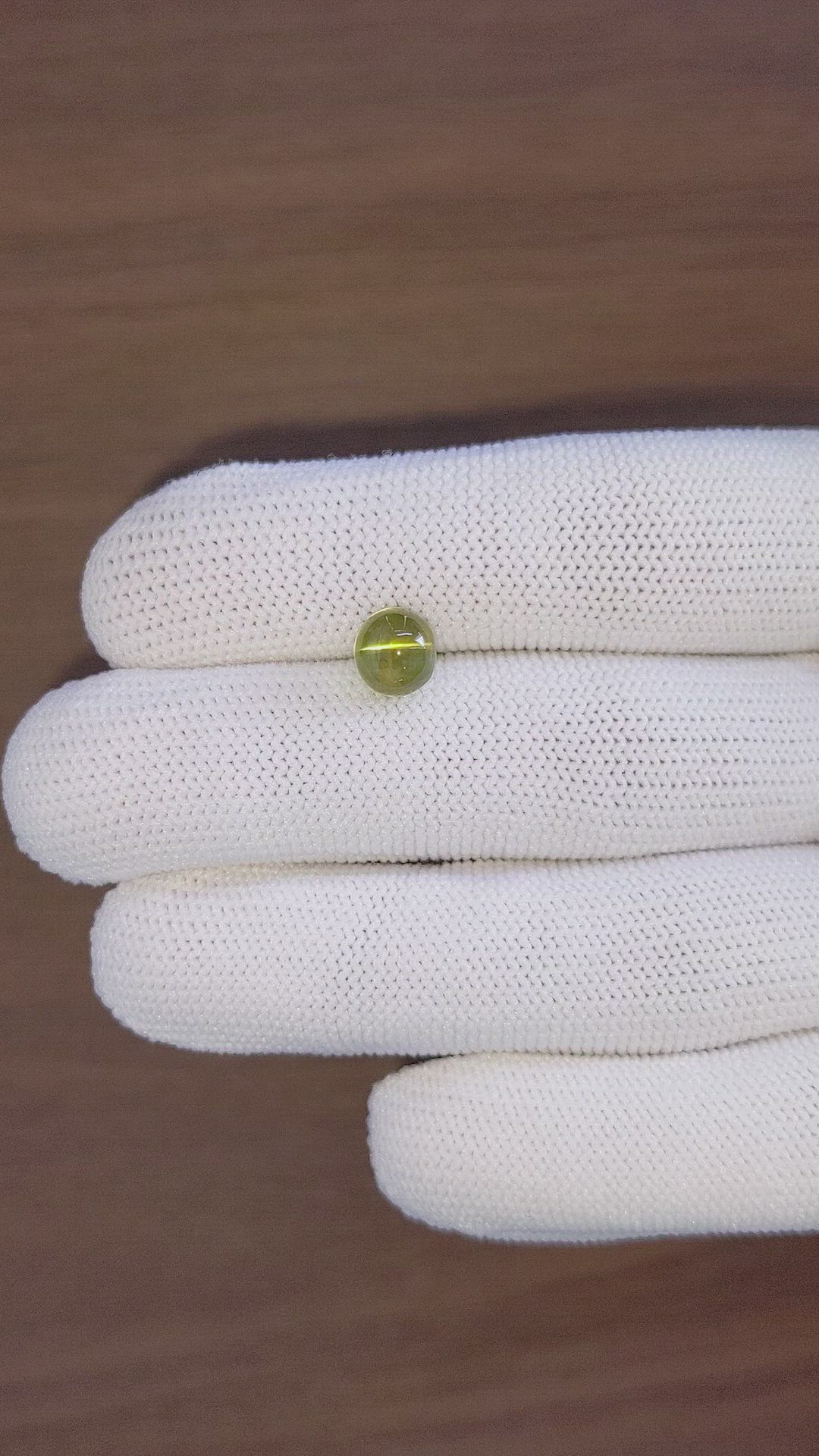 3.31 Ct. Yellowish Green Cabochon Chrysoberyl from Madagascar Size Video