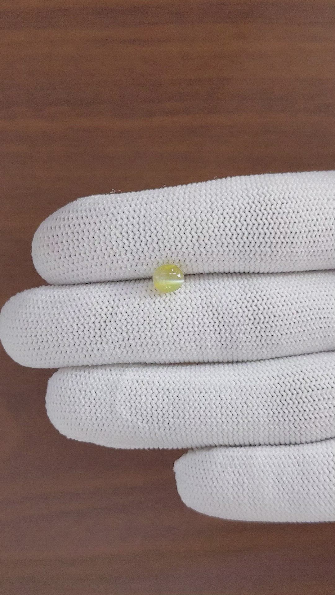1.21 Ct. Greenish Yellow Cabochon Chrysoberyl from Ceylon (Sri Lanka) Size Video