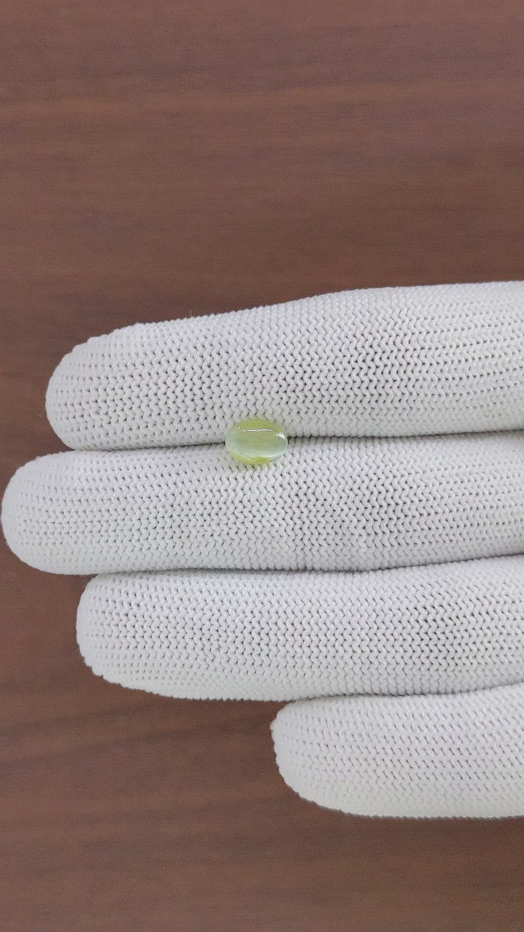 1.46 Ct. Greenish Yellow Cabochon Chrysoberyl from Ceylon (Sri Lanka) Size Video
