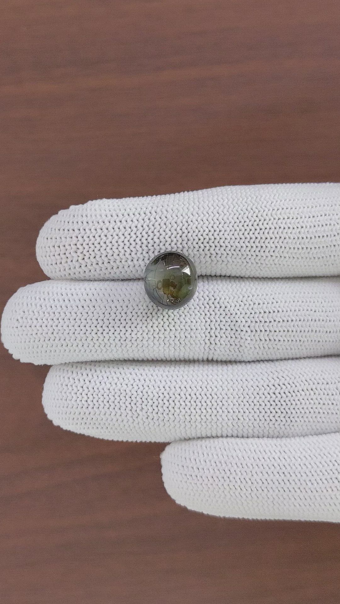 12.67 Ct. Brownish Green Cabochon Chrysoberyl from Ceylon (Sri Lanka) Size Video