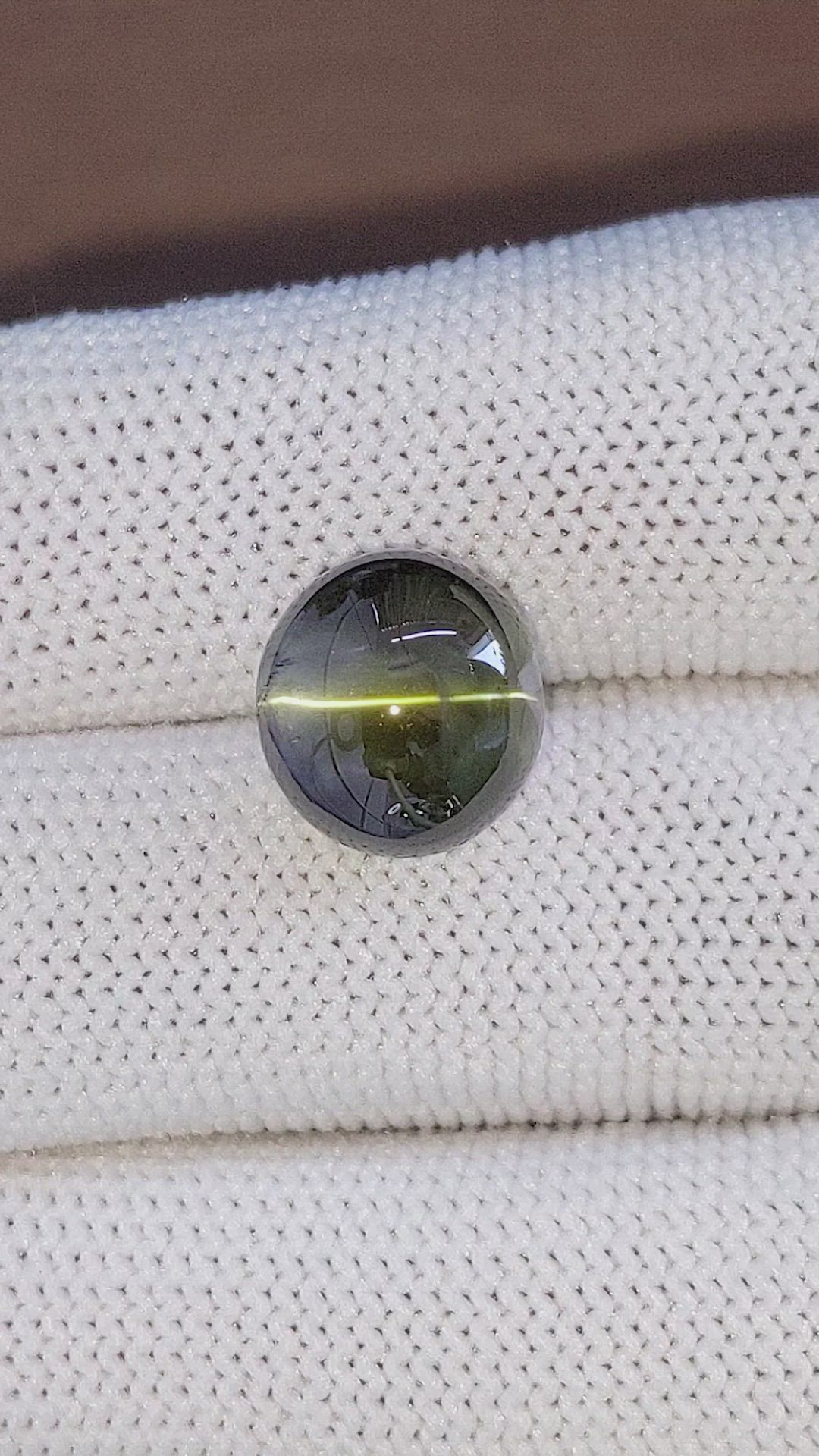 12.67 Ct. Brownish Green Cabochon Chrysoberyl from Ceylon (Sri Lanka) Size Video