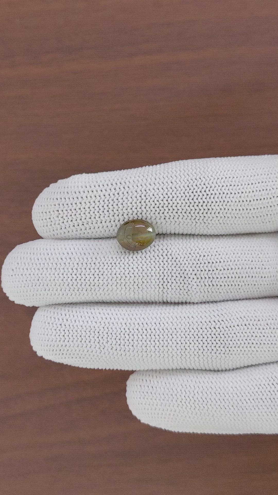 3.10 Ct. Greenish Brown Cabochon Chrysoberyl from Ceylon (Sri Lanka) Size Video