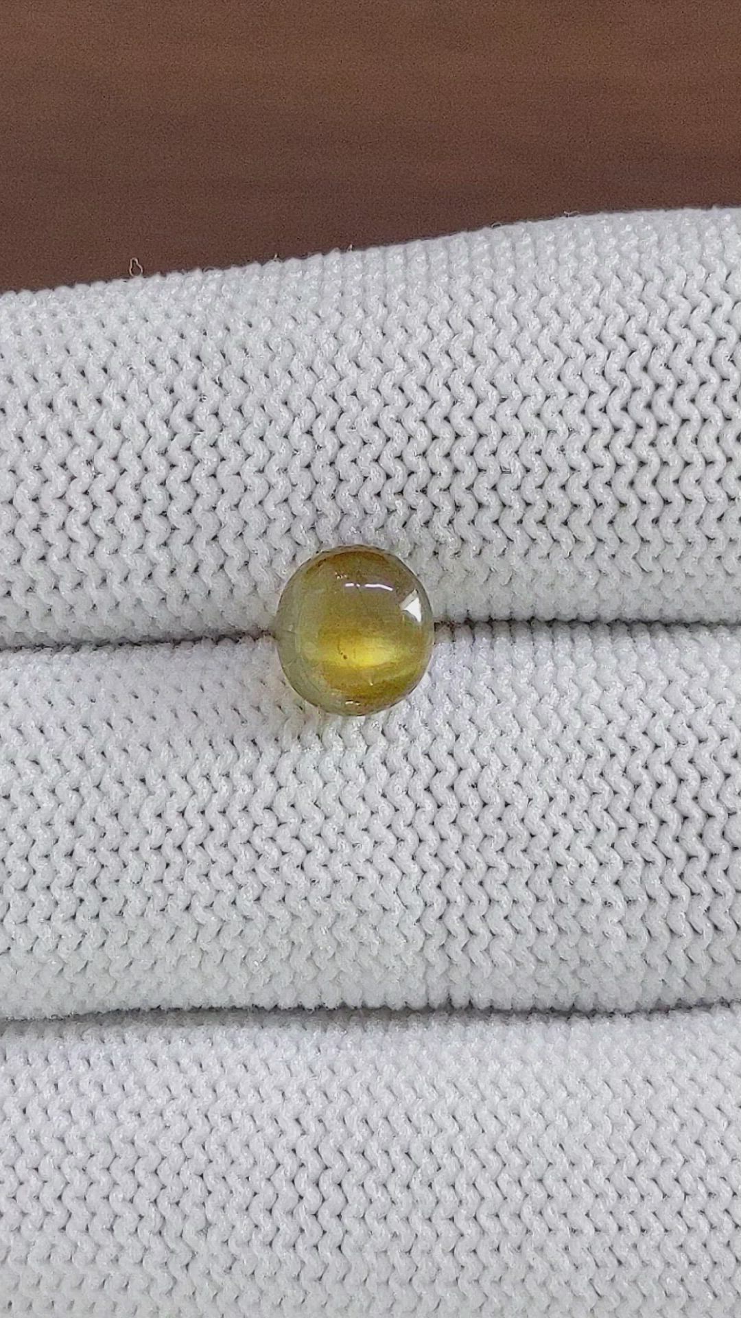 3.05 Ct. Brown Cabochon Chrysoberyl from Ceylon (Sri Lanka) Size Video