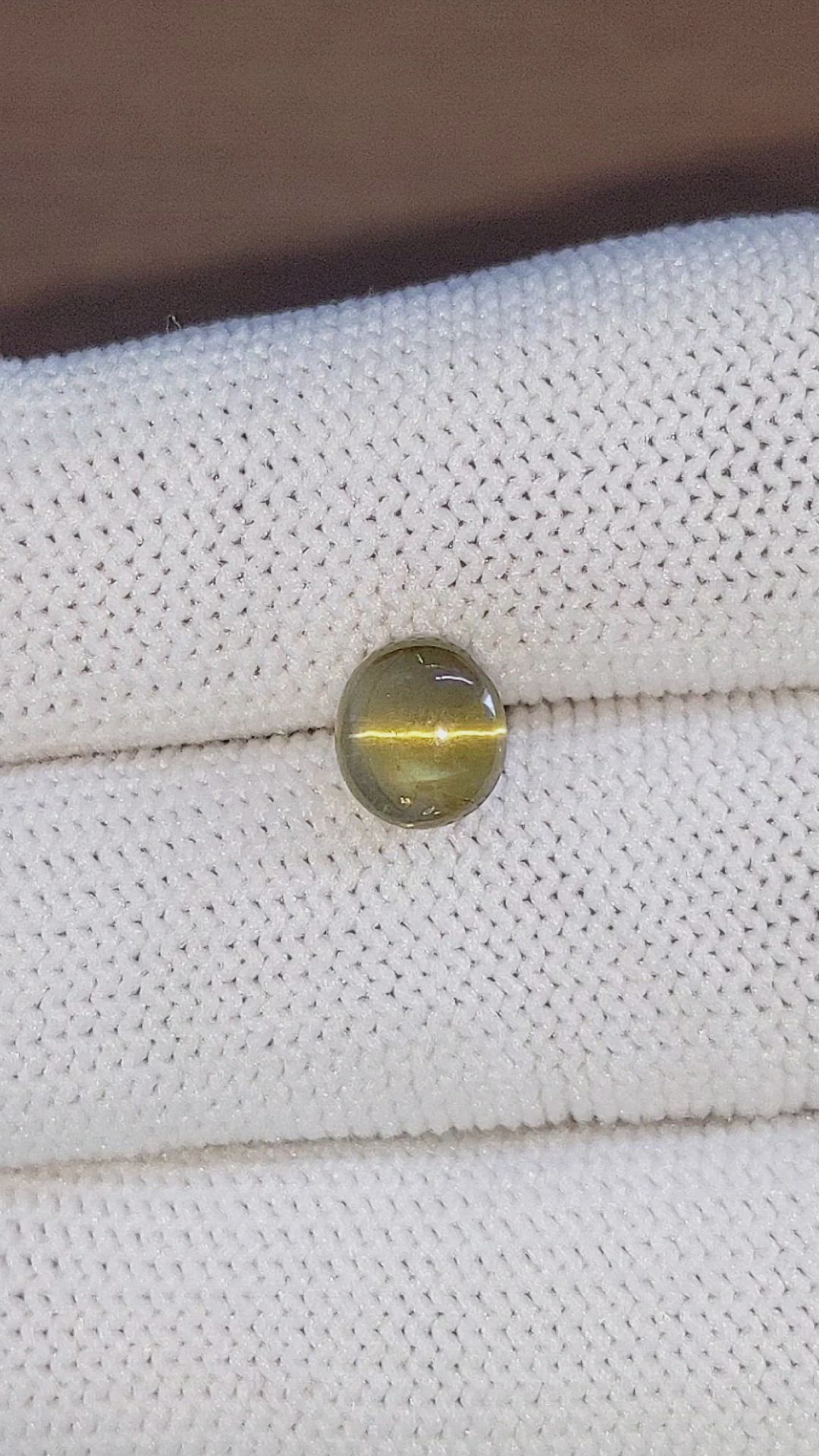 3.05 Ct. Brown Cabochon Chrysoberyl from Ceylon (Sri Lanka) Size Video