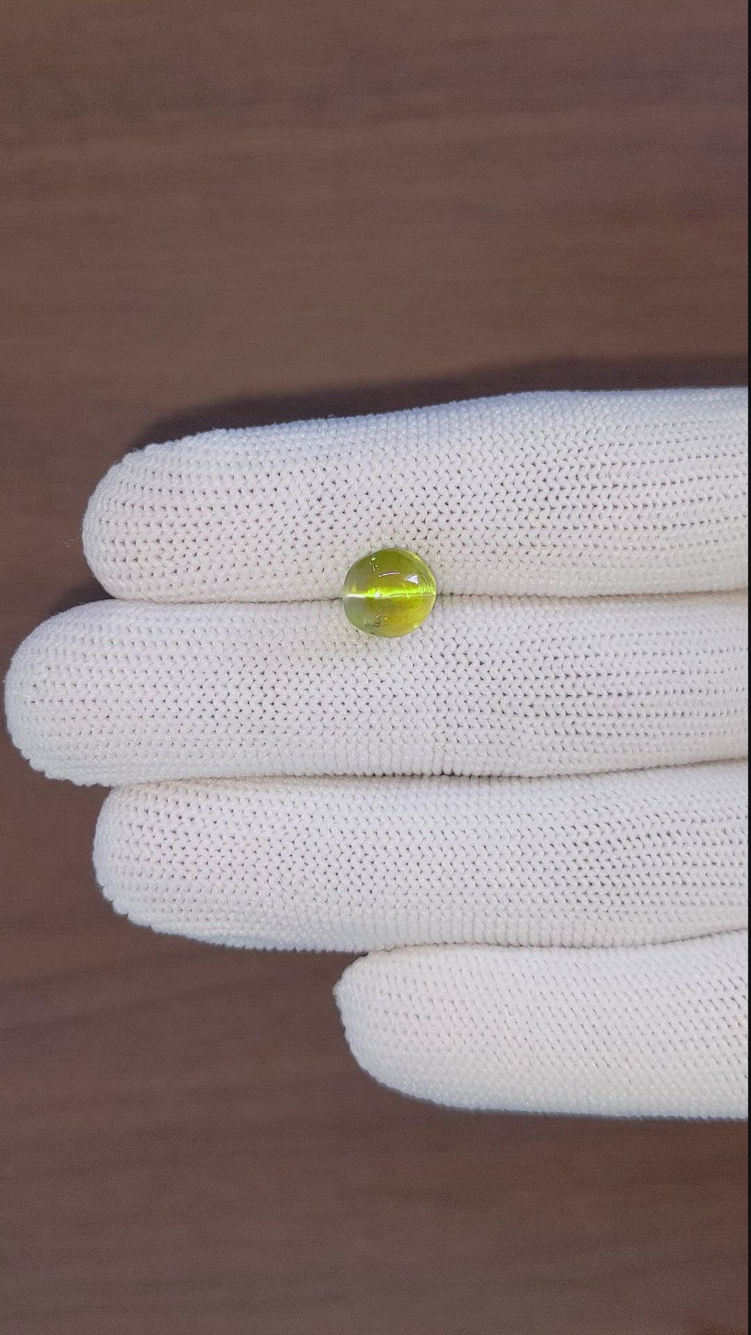 5.66 Ct. Yellowish Green Cabochon Chrysoberyl from Ceylon (Sri Lanka) Size Video