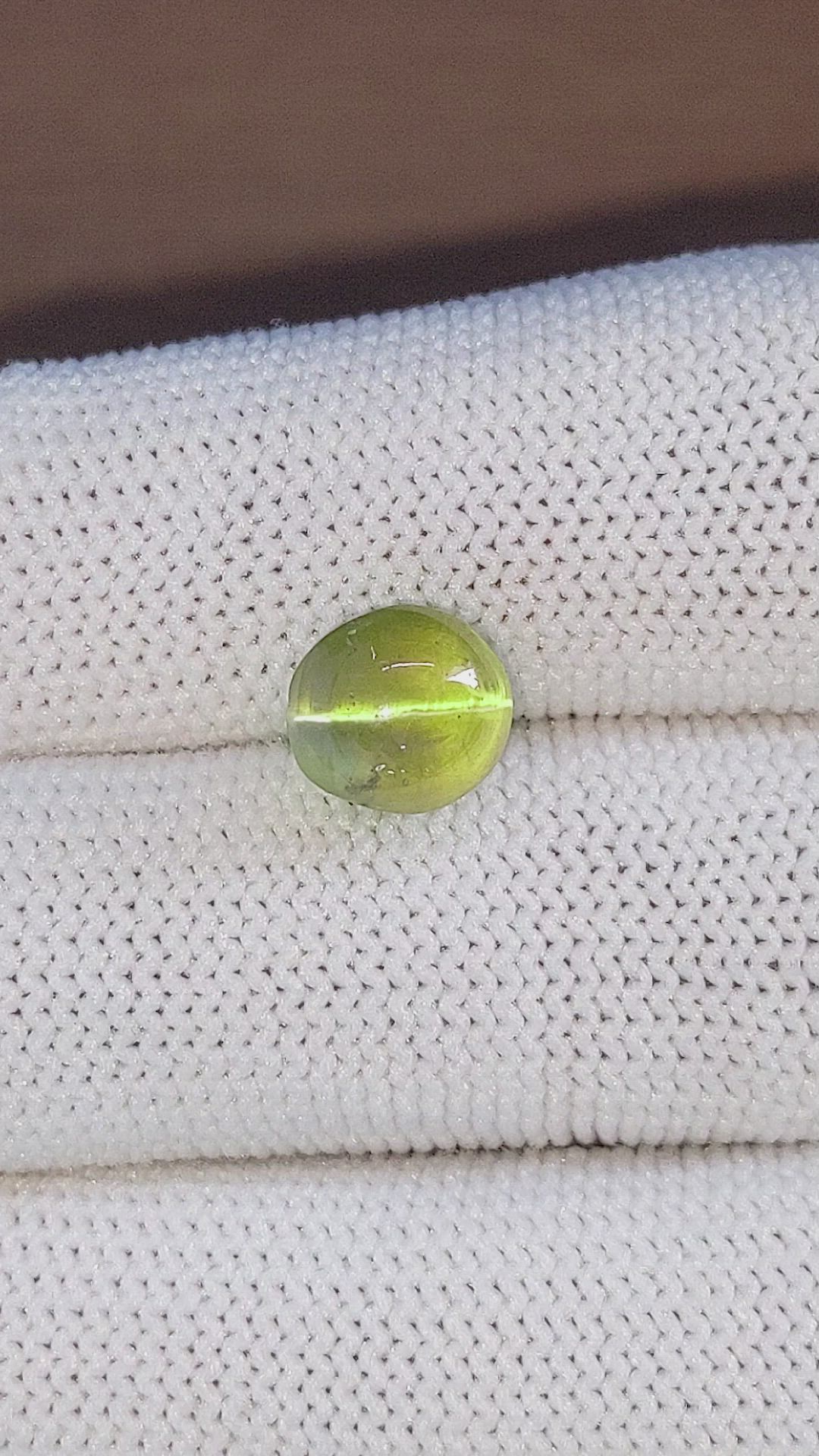 5.66 Ct. Yellowish Green Cabochon Chrysoberyl from Ceylon (Sri Lanka) Size Video