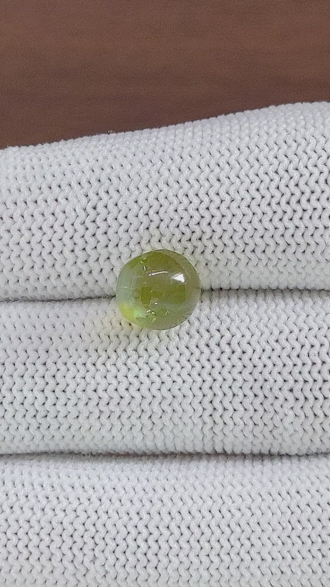 5.66 Ct. Yellowish Green Cabochon Chrysoberyl from Ceylon (Sri Lanka) Size Video