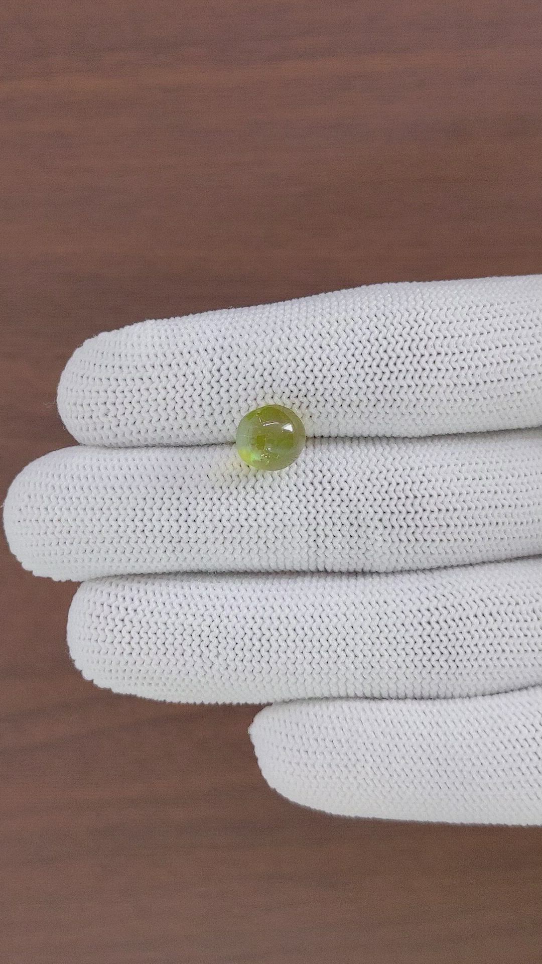 5.66 Ct. Yellowish Green Cabochon Chrysoberyl from Ceylon (Sri Lanka) Size Video