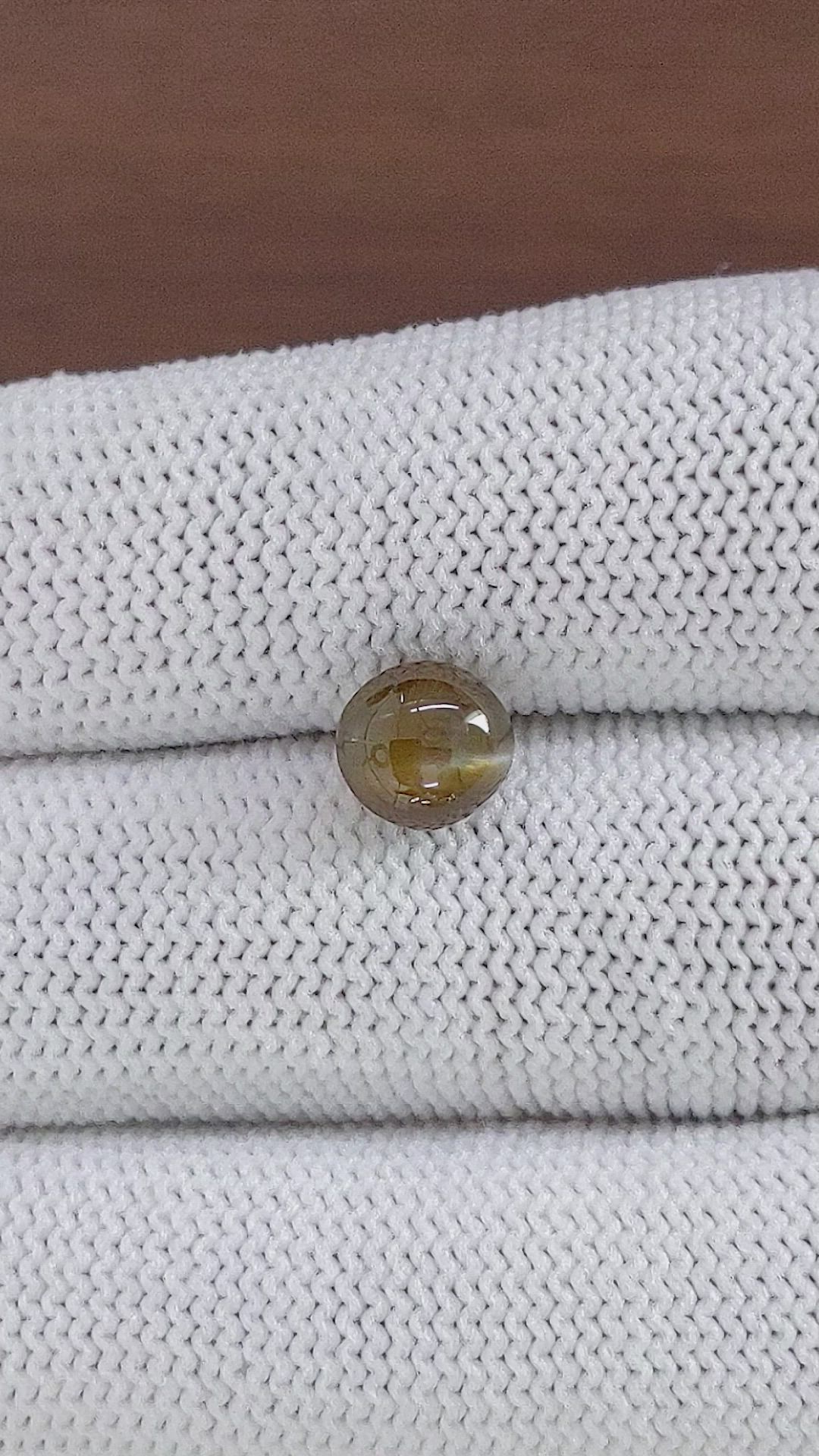 3.03 Ct. Greenish Brown Cabochon Chrysoberyl from Ceylon (Sri Lanka) Size Video