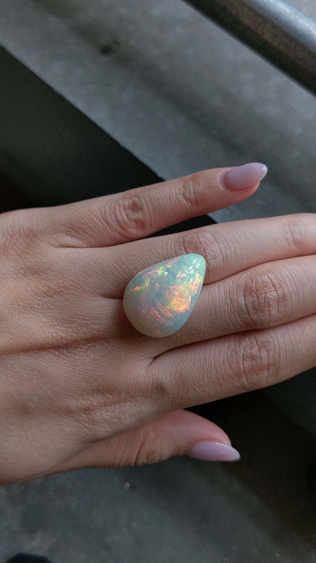23.56 Ct. Multi Color Cabochon White Opal from Australia Size Video