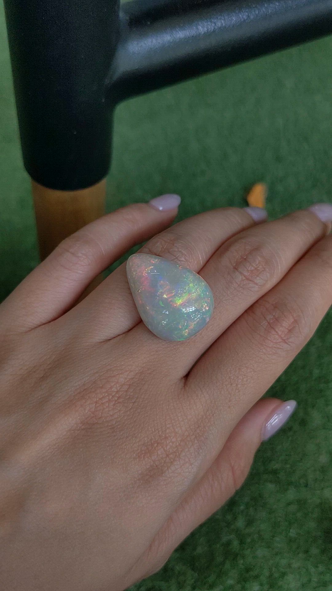 23.56 Ct. Multi Color Cabochon White Opal from Australia Size Video