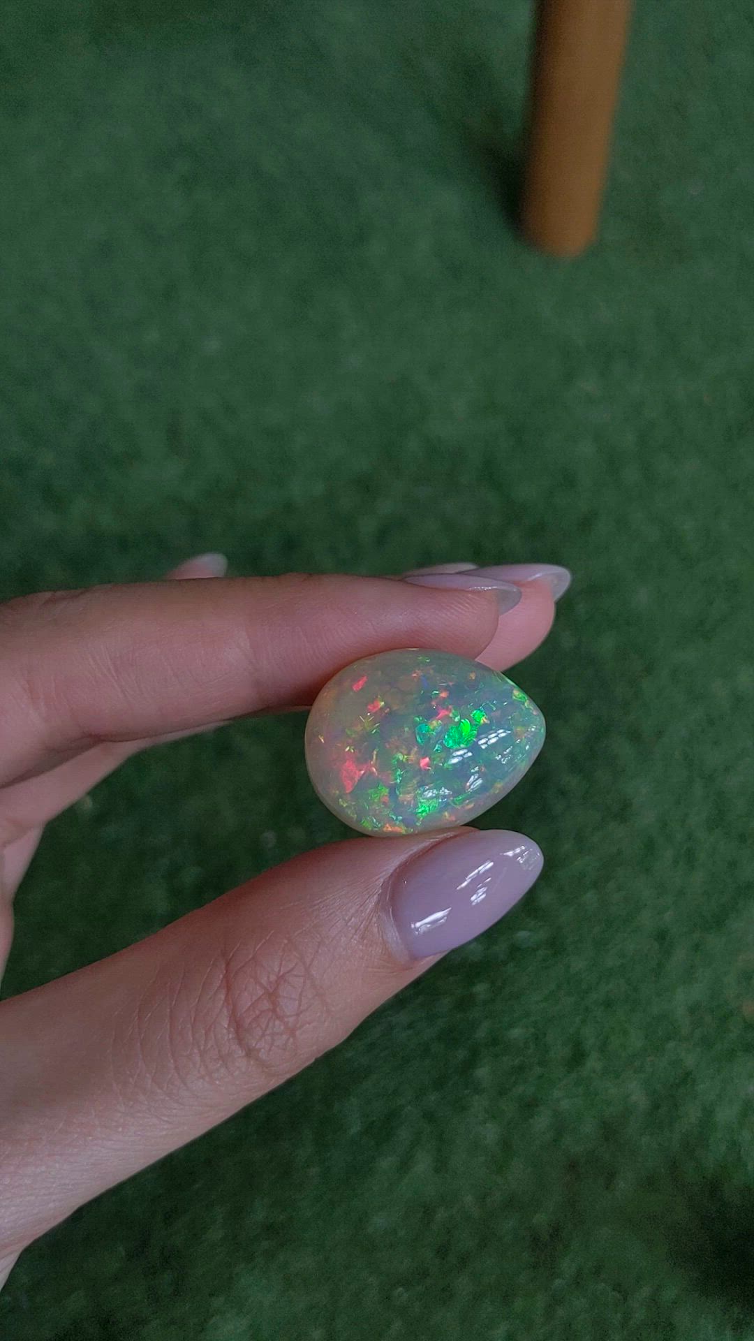 21.14 Ct. Multi Color Cabochon Semi-Black Opal from Ethiopia Size Video