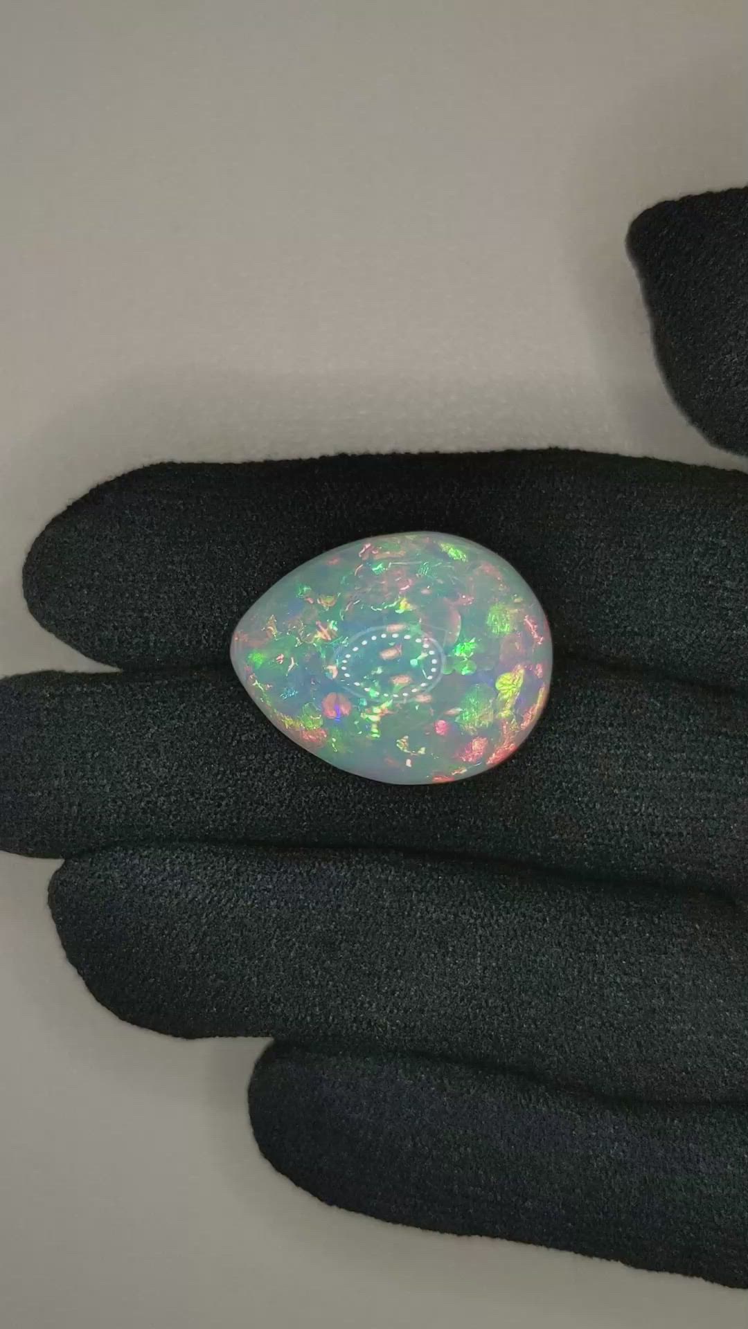 21.14 Ct. Multi Color Cabochon Semi-Black Opal from Ethiopia Size Video