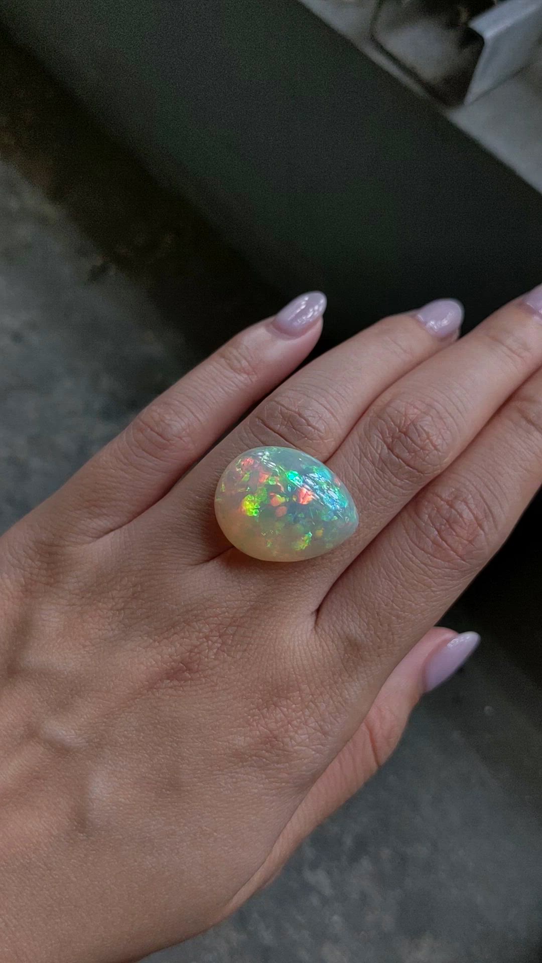 21.14 Ct. Multi Color Cabochon Semi-Black Opal from Ethiopia Size Video