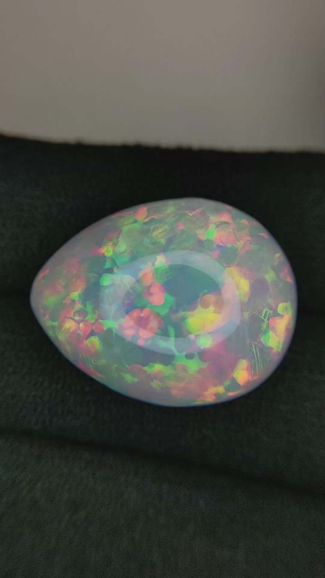 21.14 Ct. Multi Color Cabochon Semi-Black Opal from Ethiopia Size Video