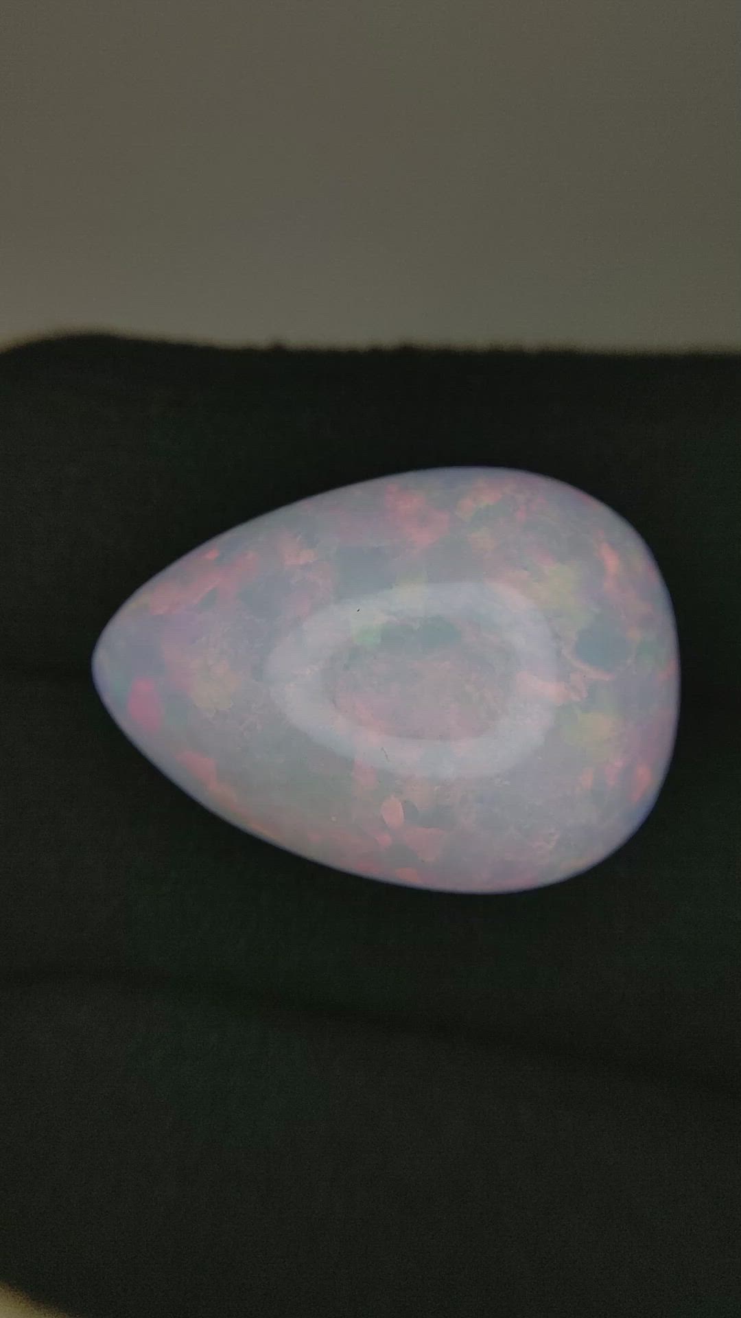19.43 Ct. Multi Color Cabochon White Opal from Ethiopia Size Video