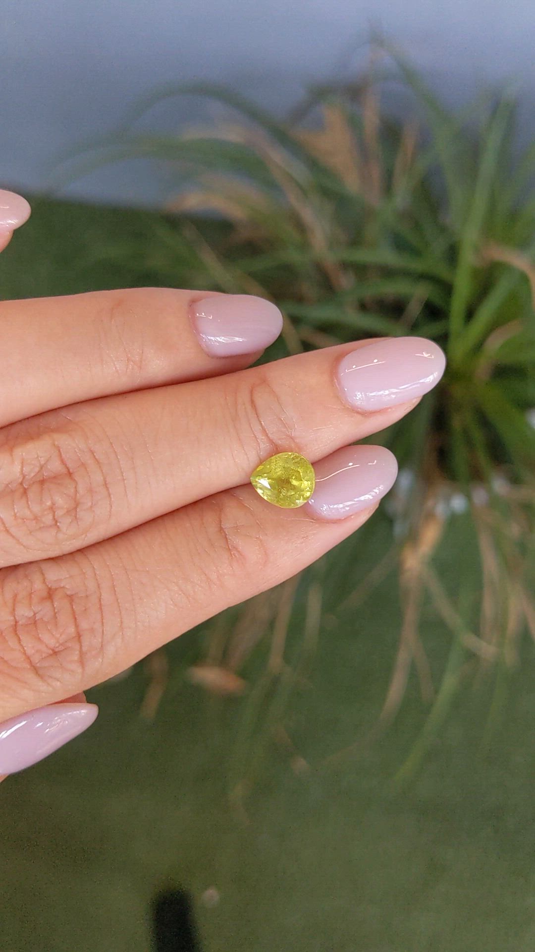 1.89 Ct. Yellowish Green Sphene (Titanite) from Madagascar Size Video