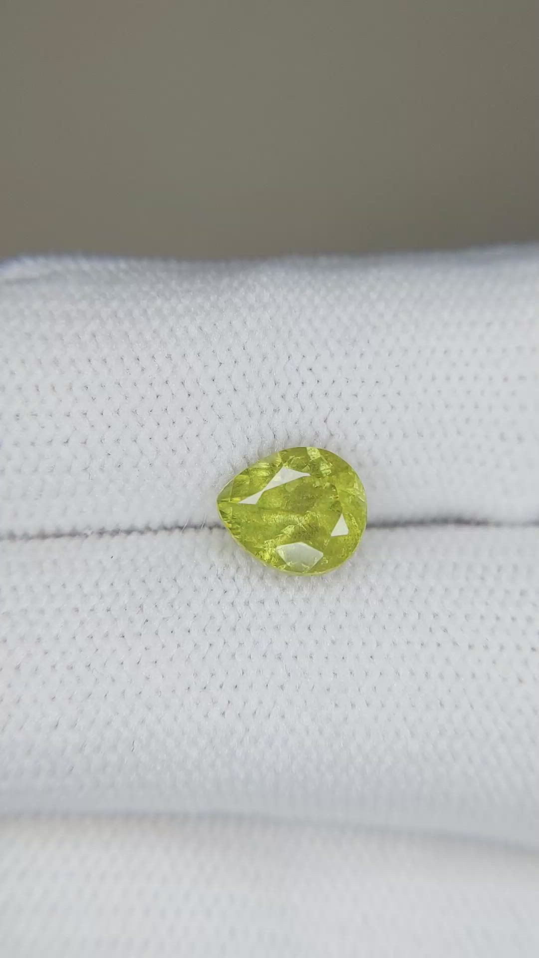 1.89 Ct. Yellowish Green Sphene (Titanite) from Madagascar Size Video