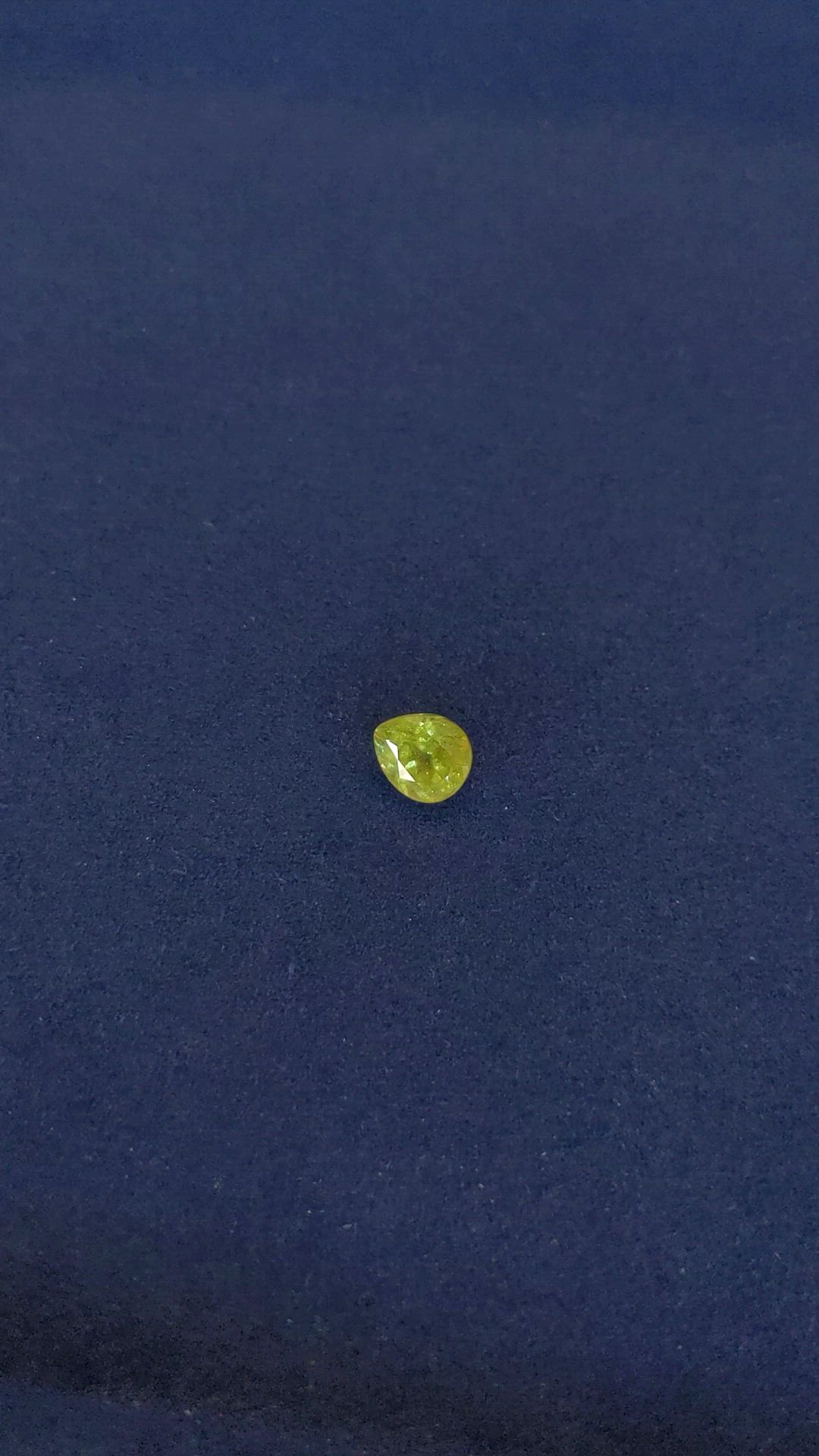 1.89 Ct. Yellowish Green Sphene (Titanite) from Madagascar Size Video