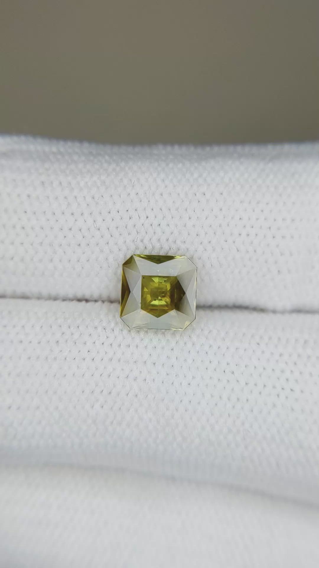1.43 Ct. Greenish Brown Sphene (Titanite) from Madagascar Size Video